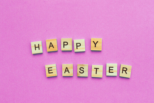 happy easter on Pink background with copy space
