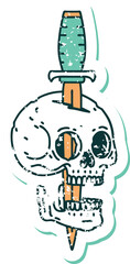 distressed sticker tattoo style icon of a skull and dagger