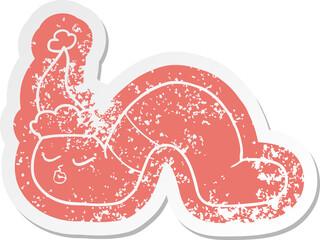 cartoon distressed sticker of a worm wearing santa hat