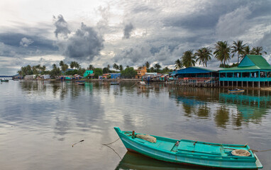 Fishing village and turqoise fisher boat, Ham Ninh, Phu Quoc, Vietnam