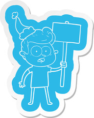 cartoon  sticker of a staring man wearing santa hat