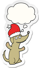 cute christmas cartoon dog and thought bubble as a printed sticker