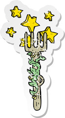 retro distressed sticker of a cartoon ornate wooden fork