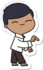 sticker of a cartoon smiling boy pointing