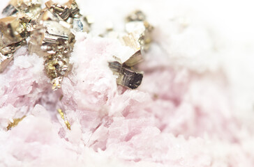 Pink background of texture rhodochrosite crystals closeup
