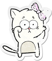 distressed sticker of a cartoon cat