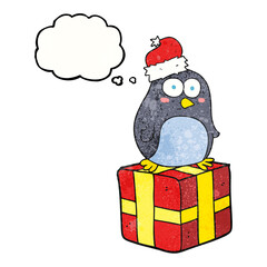 thought bubble textured cartoon christmas penguin