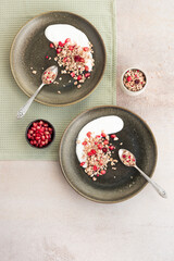 Yogurt with granola, pomegranate and red fruits..Vegetarian food, diet concept, weight loss, healthy lifestyle and eating..Copy space.