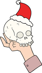 line drawing of a hand holding skull wearing santa hat