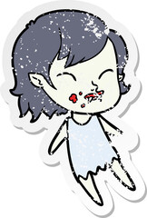 distressed sticker of a cartoon vampire girl with blood on cheek
