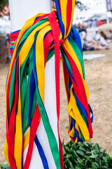 Colourful Ribbons Tied Around A Traditional English Maypole At A Village Fete