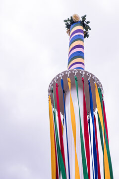 Colourful Ribbons Hanging From A Traditional English Maypole At A Village Fete