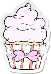 distressed sticker of a cartoon fancy cupcake