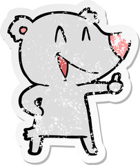 distressed sticker of a laughing bear cartoon