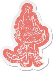 friendly cartoon distressed sticker of a wolf giving peace sign wearing santa hat