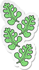 sticker of a cartoon leaves