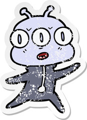 distressed sticker of a cartoon three eyed alien