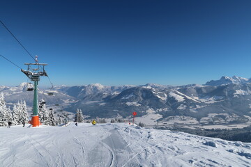 Snowy slopes and a chair lift in the Austrian alps