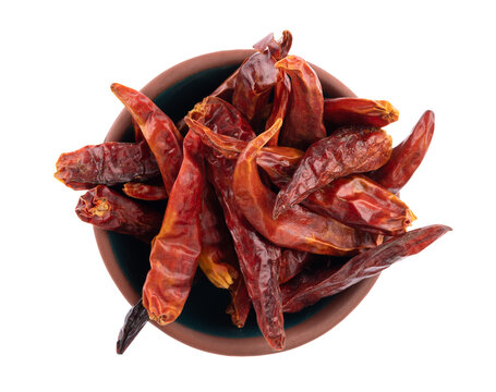 Vietnamese chili peppers in a small terracotta bowl top view.