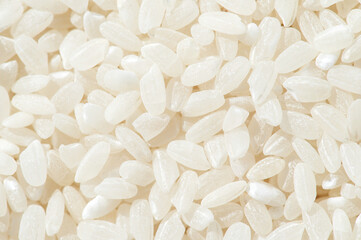 Texture of white rice seeds. Directly above