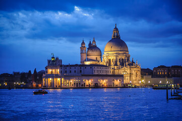 Santa Maria della Salute church in Venice, Italy, in blue light