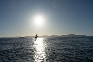 stand up on the sunset