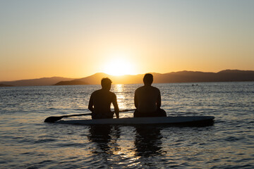 silhouette of a couple on the beach