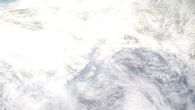 Earth zoom in from outer space to city. Zooming on Homer, Alaska, USA. The animation continues by zoom out through clouds and atmosphere into space. Images from NASA