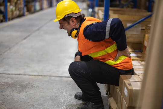 The warehouse worker suffered from a back injury while lifting and carrying heavy gear and keeping a twisted posture. Muscles can get strained, overused through continuous, repetitive movements.