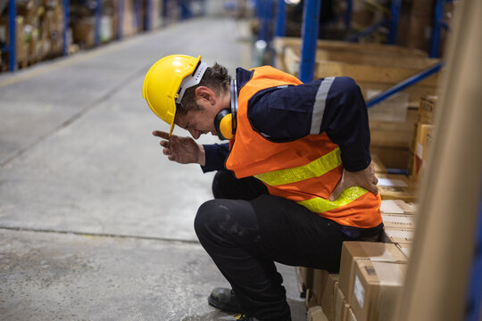 The warehouse worker suffered from a back injury while lifting and carrying heavy gear and keeping a twisted posture. Muscles can get strained, overused through continuous, repetitive movements.