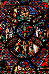 Fototapeta premium Notre-Dame du Port basilica, Clermont-Ferrand, Auvergne. France. Stained glass. Genesis.
