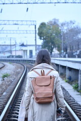 person on train tracks