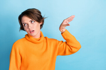 Photo of unsatisfied annoyed person arm demonstrate bla blah gesture isolated on blue color...