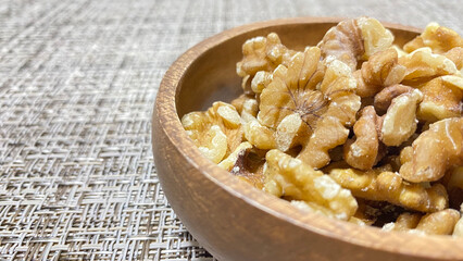 walnuts in a wooden plate