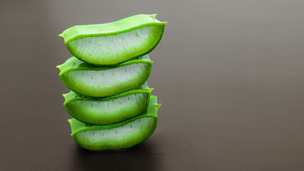 Aloe vera stacked isolated on black background, Aloe vera is a very useful medicinal herb for skin care and hair care.	