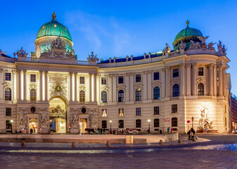 Hofburg palace on St. Michael square (Michaelerplatz) at night, Vienna, Austria