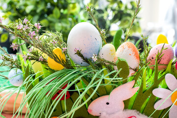 Easter background with eggs and spring flowers