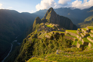Sunset on Machu Picchu, the lost city of Inca - Peru - 584354321