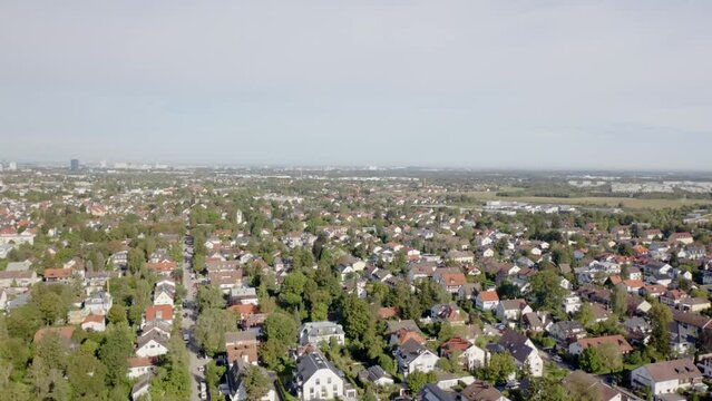 Beautiful view of buildings and park with trees in the city of Munich, Germany