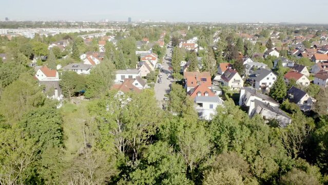 Beautiful view of buildings and park with trees in the city of Munich, Germany