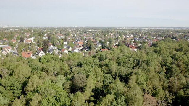 Beautiful view of buildings and park with trees in the city of Munich, Germany