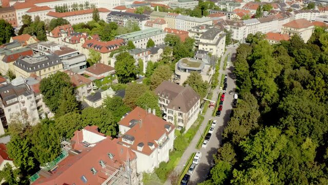 Beautiful view of buildings and park with trees in the city of Munich, Germany