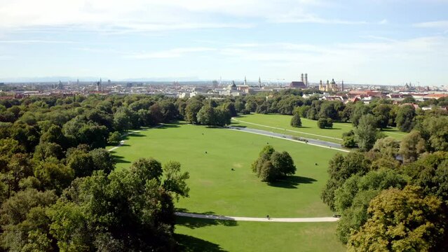 Beautiful view of buildings and park with trees in the city of Munich, Germany
