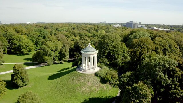 Beautiful view of a gazebo and park with trees in the city of Munich, Germany