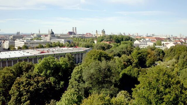 Beautiful view of buildings and park with trees in the city of Munich, Germany