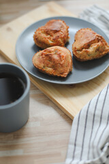 Fresh delicious breakfast with coffee and handmade cookies on white table top view. Selective focus. Handmade cookies in form of heart on the table top view.Romantic weekend concept.