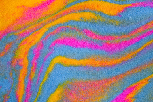 Close-up view of beautiful abstract multicolored waves made from colorful clay plasticine