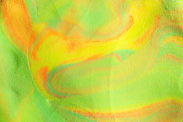Close-up view of beautiful abstract multicolored waves made from colorful clay plasticine