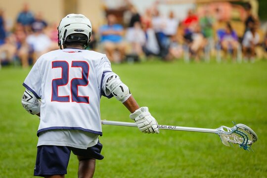 Lacrosse player in the field in action