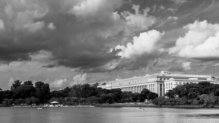 Beautiful grayscale view of a government building across the water in Washington DC